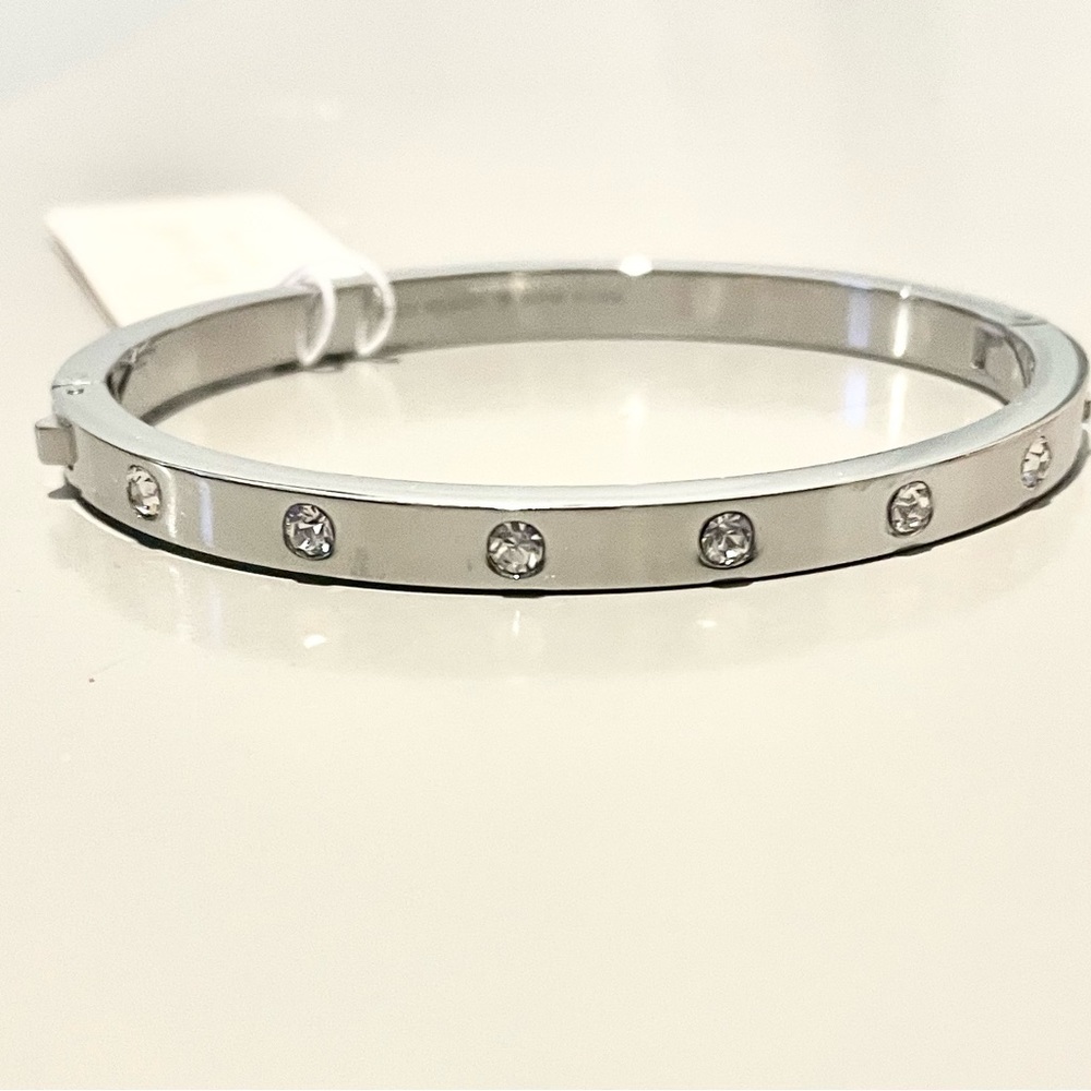 Kate Spade thin bangle bracelet with clear stones.